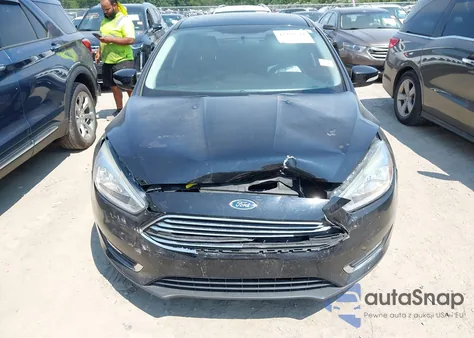 2016 Ford Focus Titanium z USA, uszkodzony, nr VIN 1FADP3J29GL305154